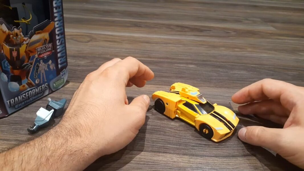 In Hand Image Of Transformers Earthspark Bumblebee Deluxe Class  (14 of 14)